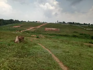 100 by 100 at Kasangati All Gated Esstate