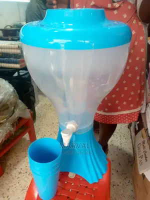 Juice Dispenser Wth Glasses