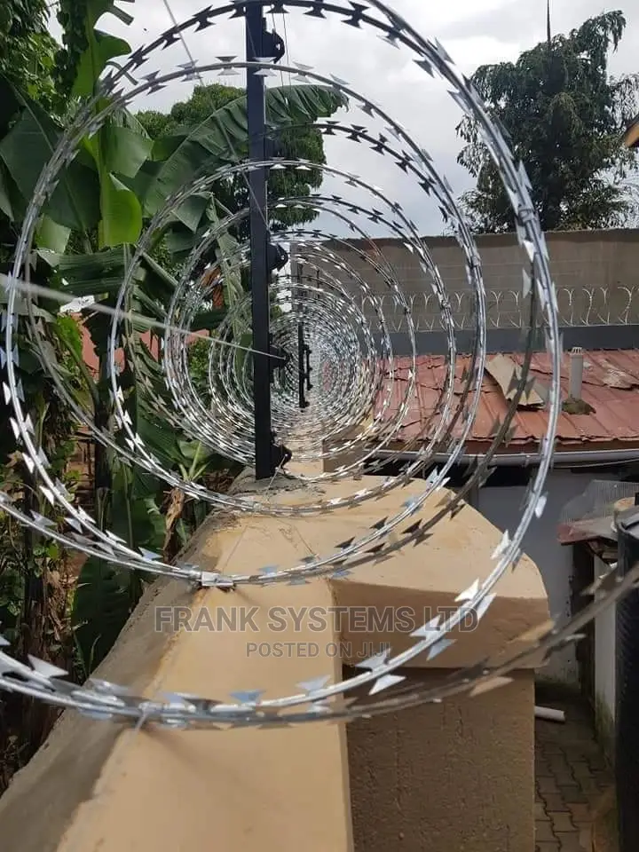 Electric Fence System With Razor Wire. Two In One