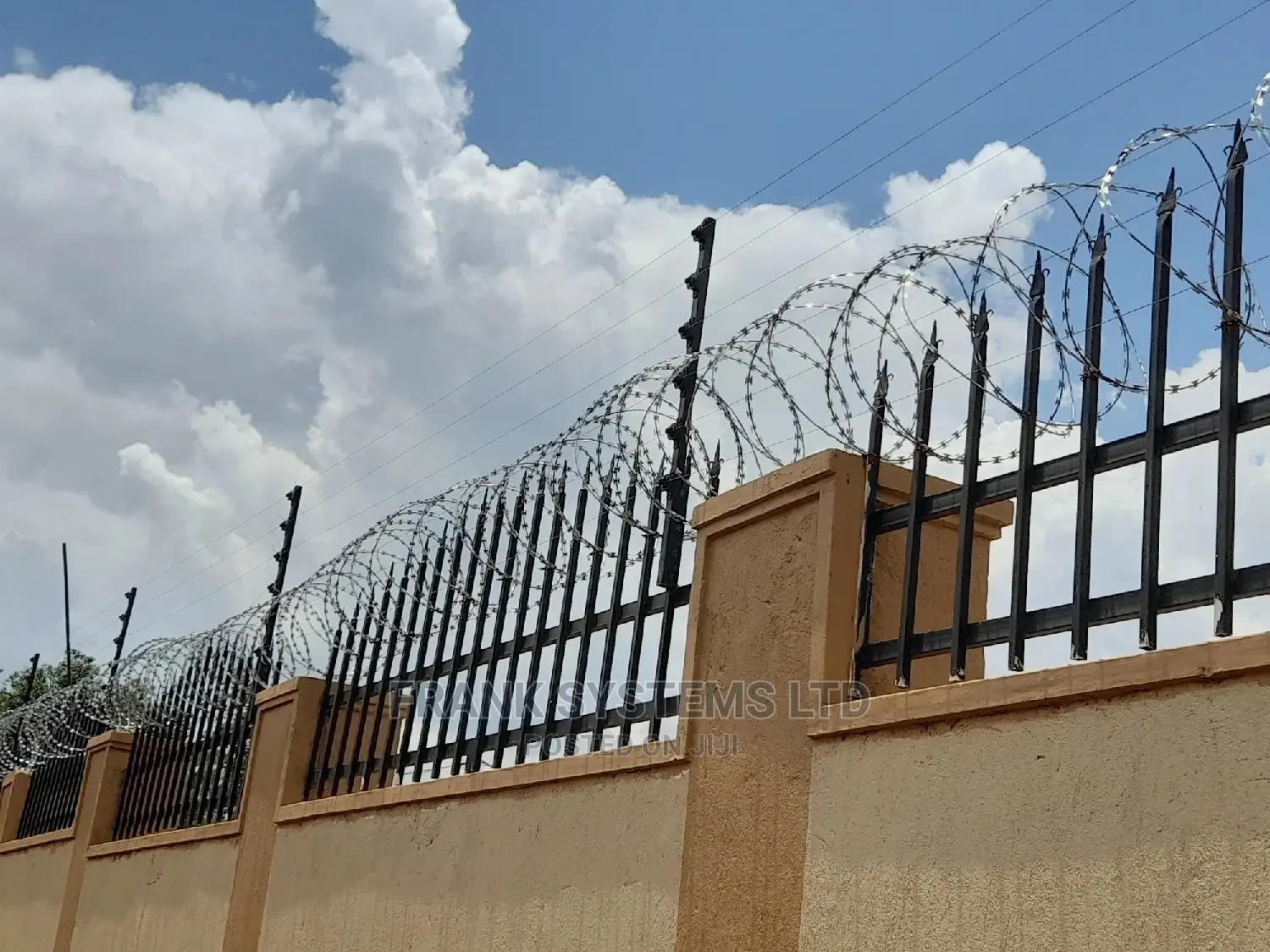 Electric Fence System With Razor Wire. Two In One