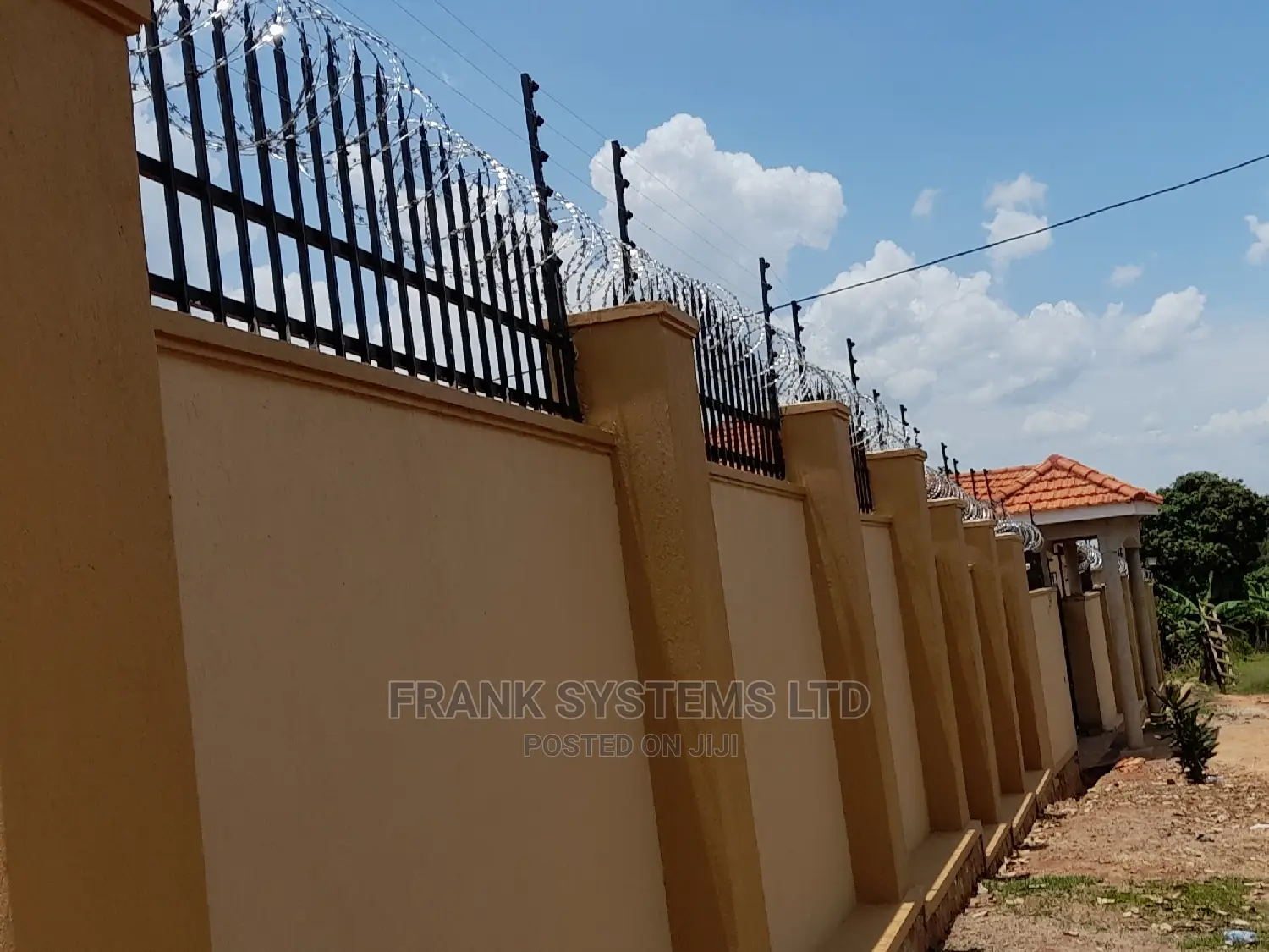 Electric Fencing System With Razor Wire.
