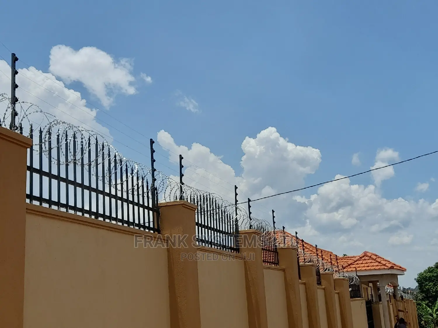 Electric Fencing System With Razor Wire.