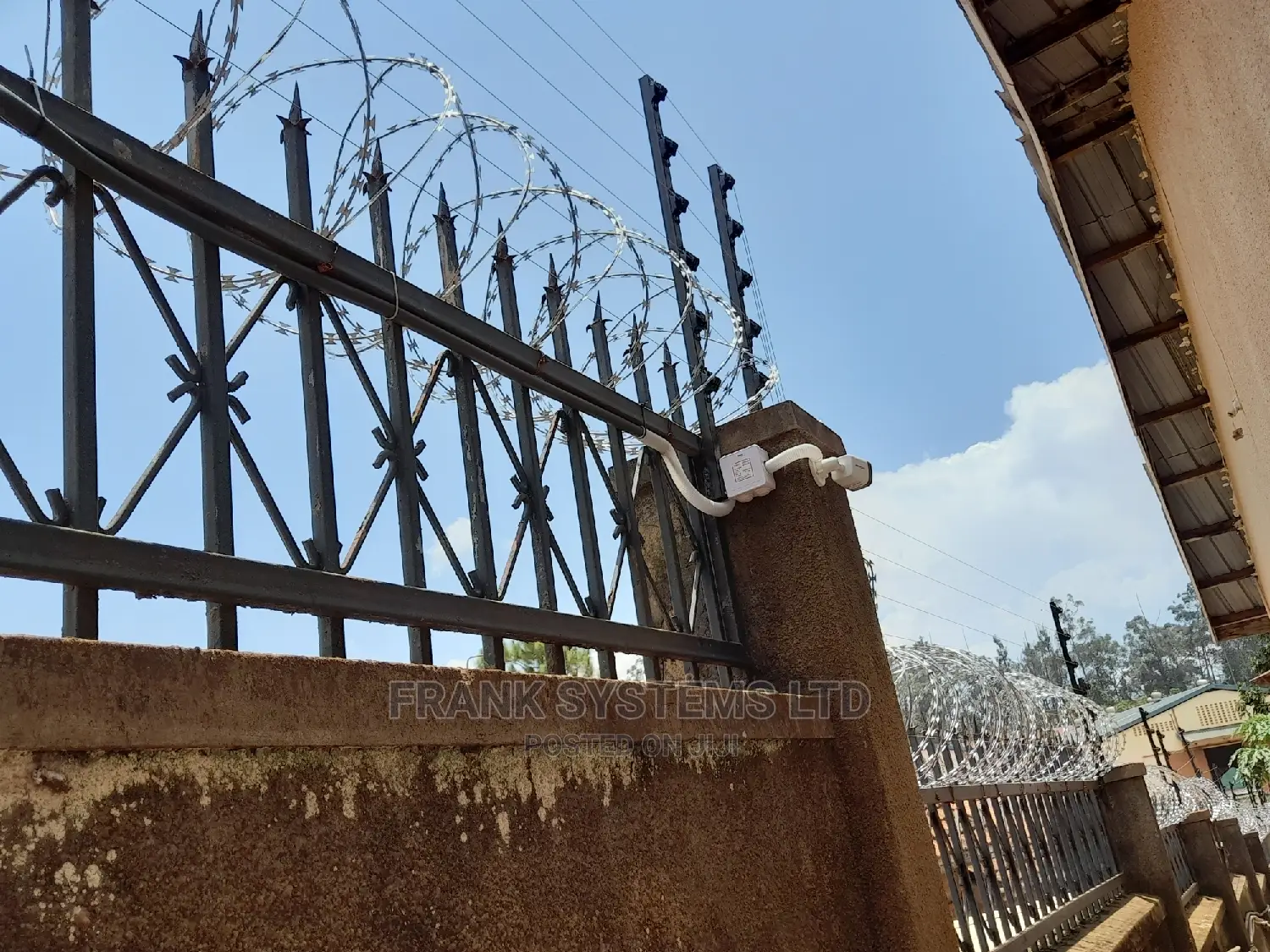 Electric Fencing System With Razor Wire.
