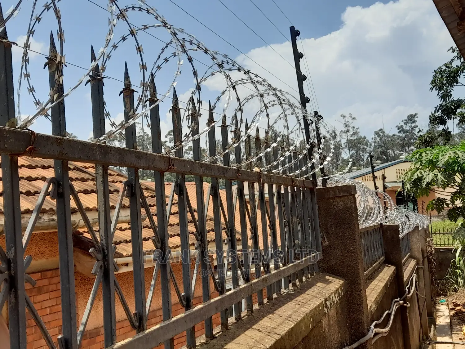 Electric Fencing System With Razor Wire.