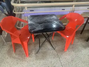 Set of Table and 2 Plastic Chairs.