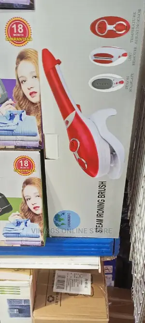 Portable Travel Steam Ironing Brush.
