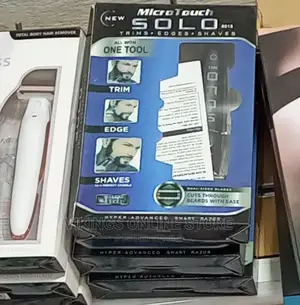 Micro Touch Solo Beard Remover) Electric Shaver.