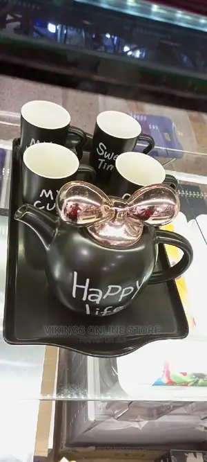 Ceramic Cup and Tea Pot Set.