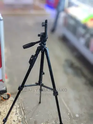Mobile Phone and Camera Are Tripod Stand