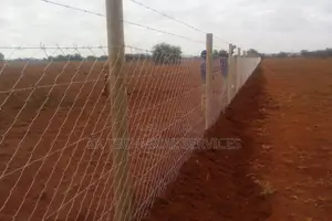 Chain Link Fencing on Wooden Poles