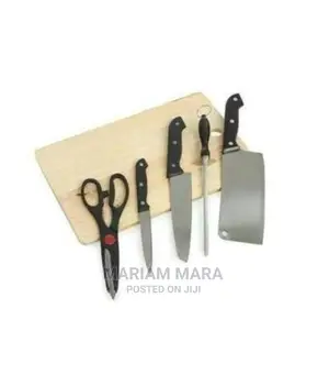Chopping Board With a Set of Knives
