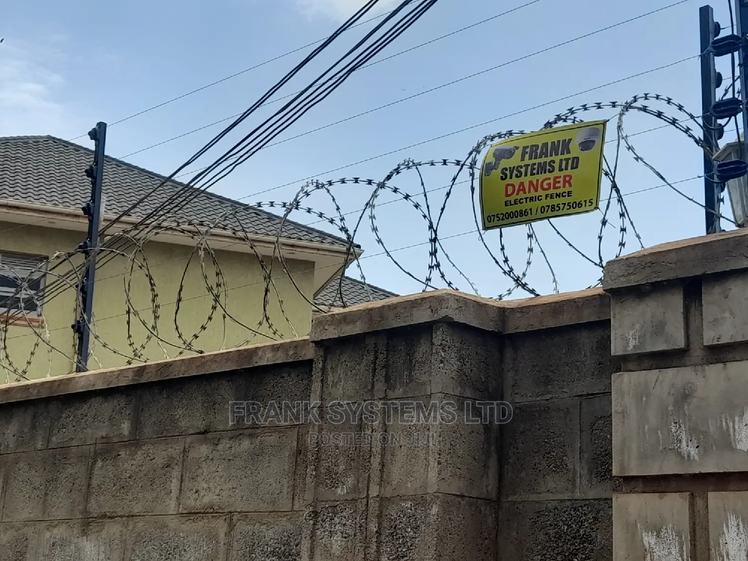 Electric Fence System With Razor Wire