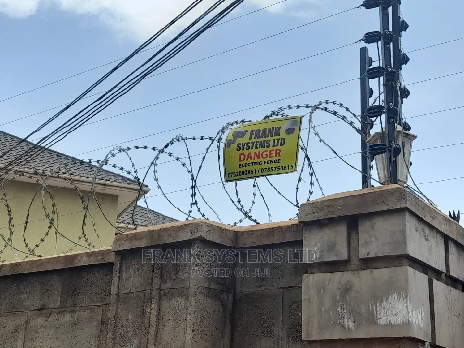 Electric Fence System With Razor Wire