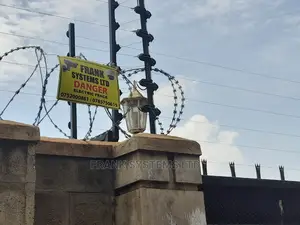 Electric Fence System With Razor Wire