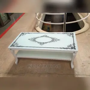 Glass Coffee Centre Table With Ametallic Frame