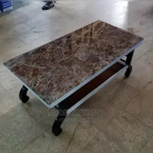 Glass Coffee Centre Table With Ametallic Frame