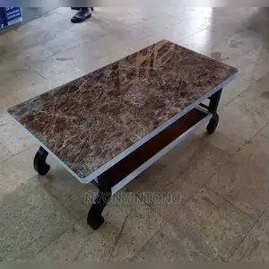 Glass Coffee Centre Table With Ametallic Frame