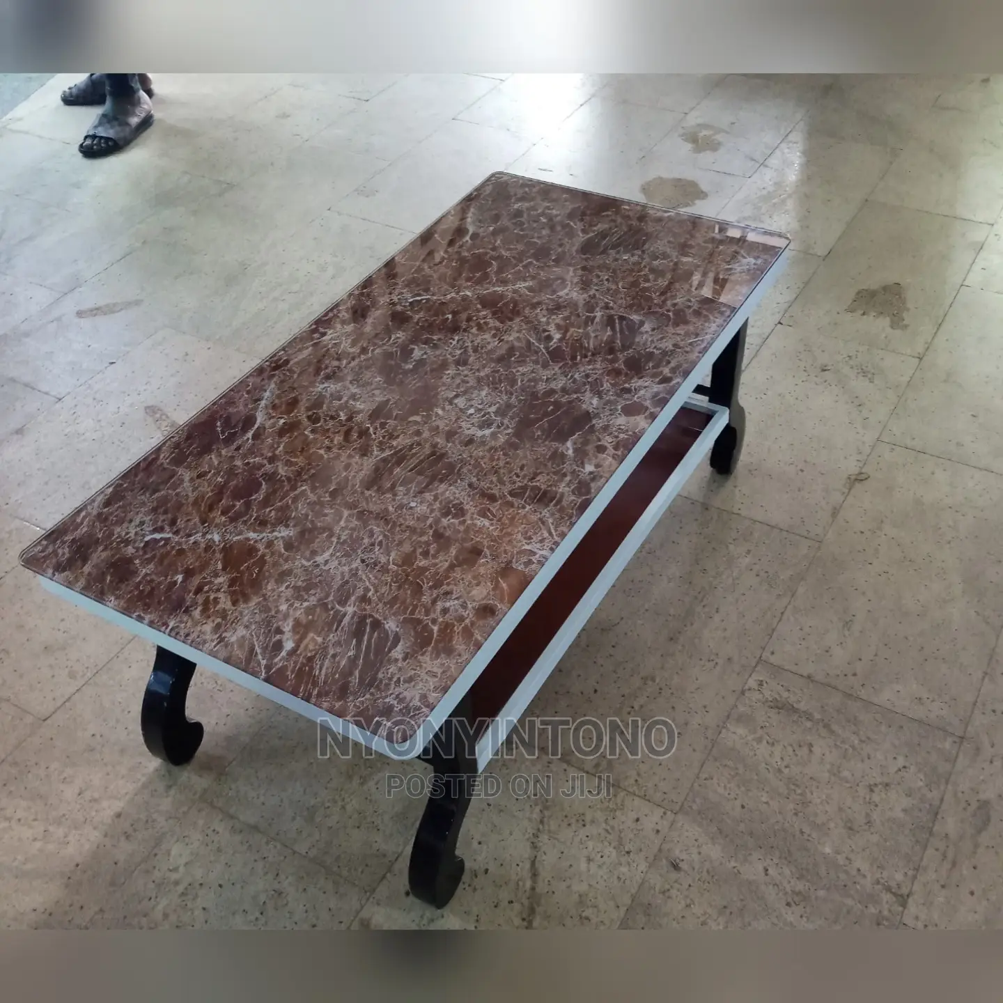 Glass Coffee Centre Table With Ametallic Frame