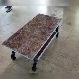 Glass Coffee Centre Table With Ametallic Frame
