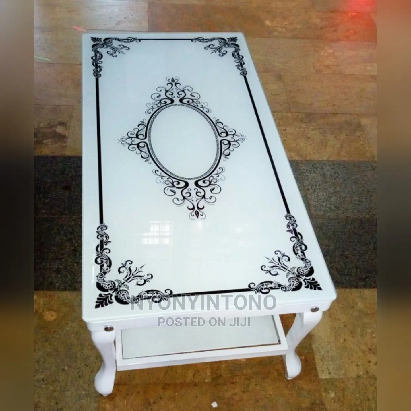 Glass Coffee Centre Table With Ametallic Frame