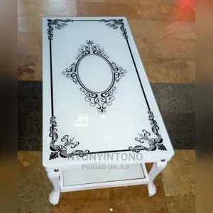 Glass Coffee Centre Table With Ametallic Frame