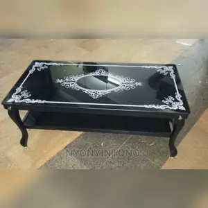 Glass Coffee Centre Table With Ametallic Frame