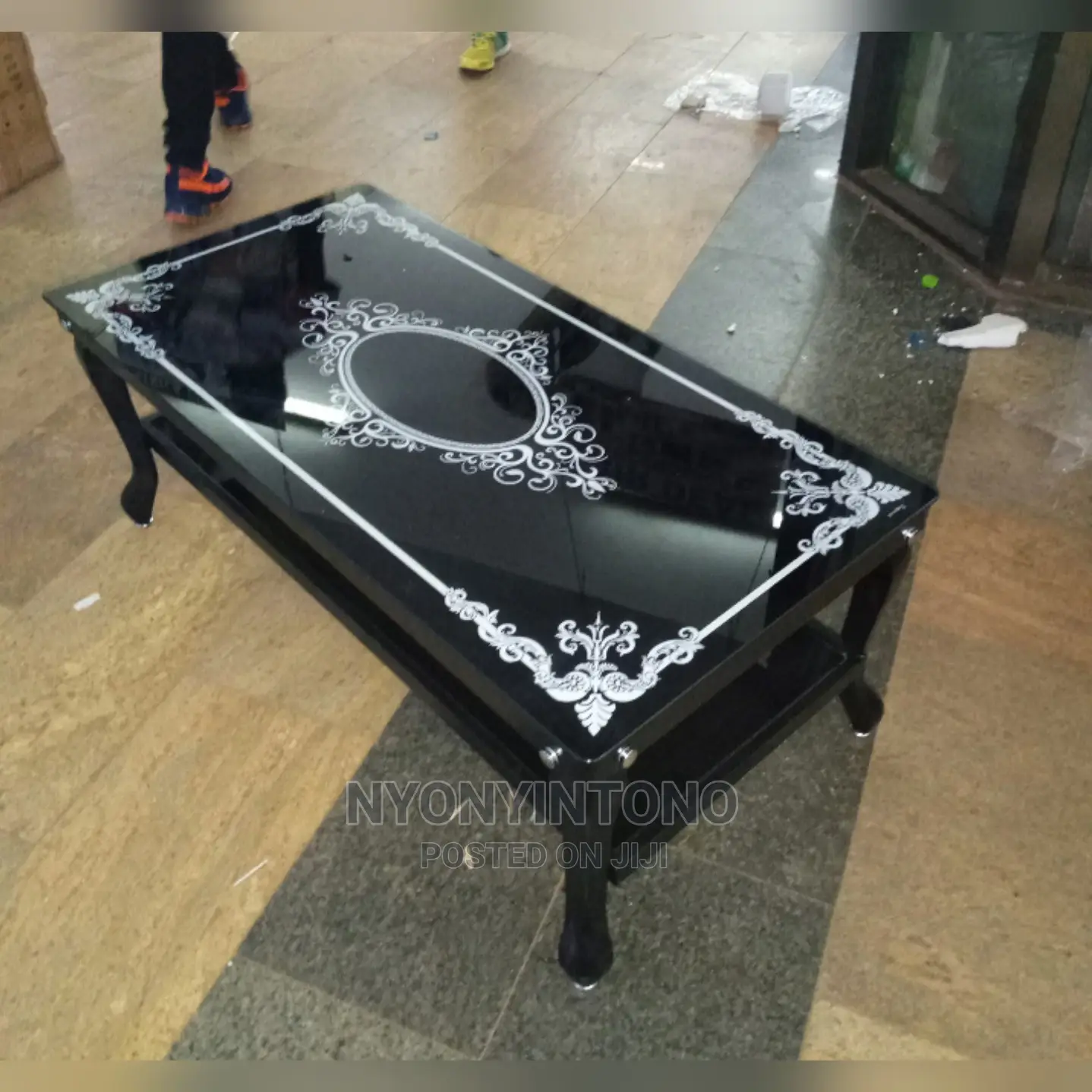Glass Coffee Centre Table With Ametallic Frame