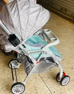 Portable Stroller With Feeding Table.