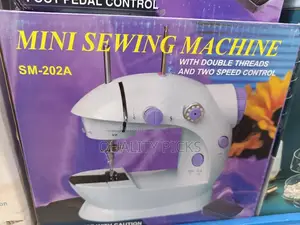 Mini Hand Sewing Machine