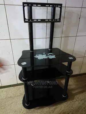 Glass Tv Stand With Ample Space for Woofers