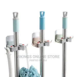 Wall Mount Mop Holder.