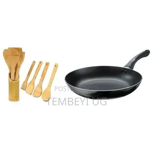Frying Pan With Wooden Cooking Spoons