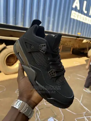 Original Triple Black Cat Air Jordan 4 Retro Sneaker