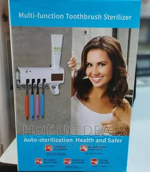 Tooth Brush Holder and Paste Dispenser With Steriliser