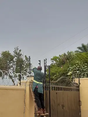Electric Wire Fencing With Razor Wire