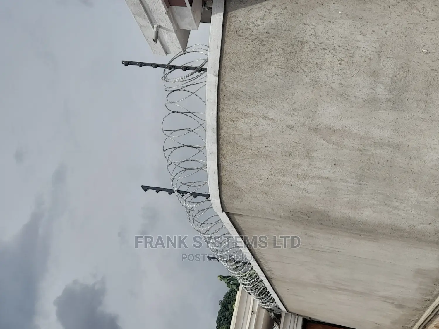 Electric Fence System With Roofing Razor Wire