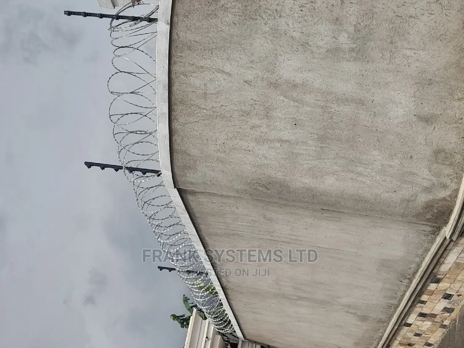 Electric Fence System With Roofing Razor Wire