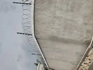 Electric Fence System With Roofing Razor Wire