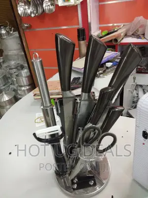 7 Piece Kitchen Knife Set On A Rotating Plate Stand - Silver
