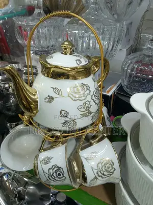 Teapot Cup and Saucer Set