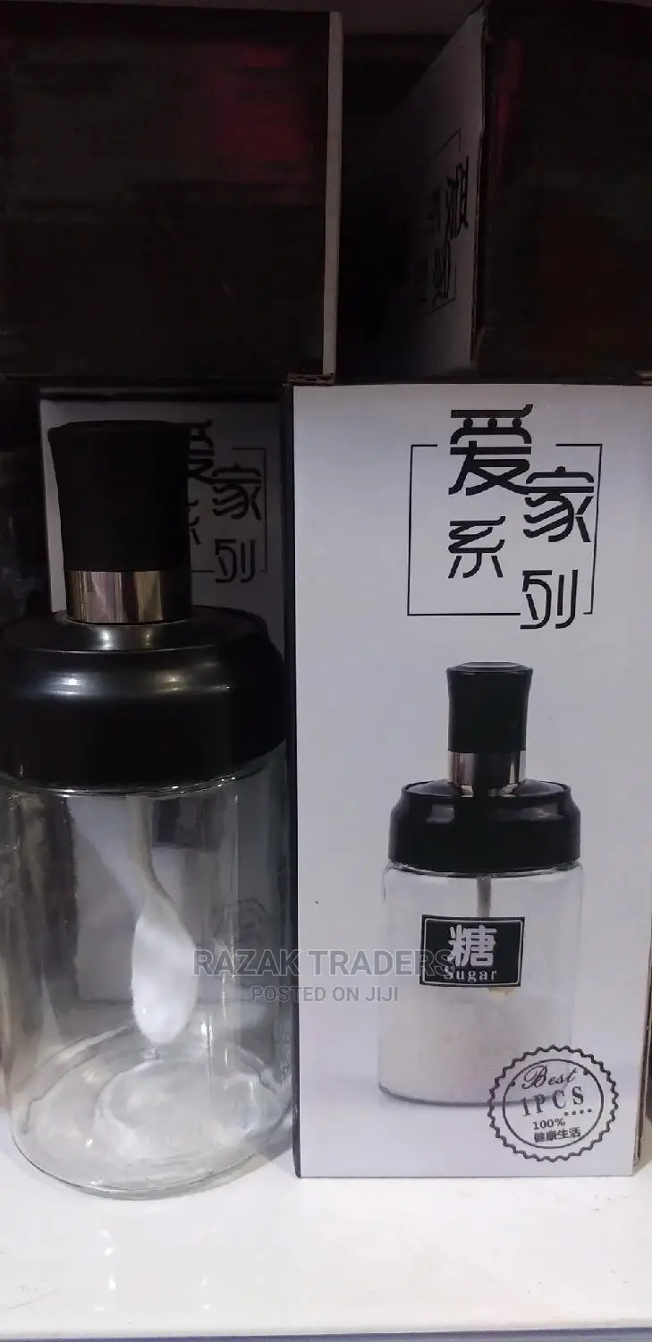 Clear Glass With Integrated Spoon for Storing Spices