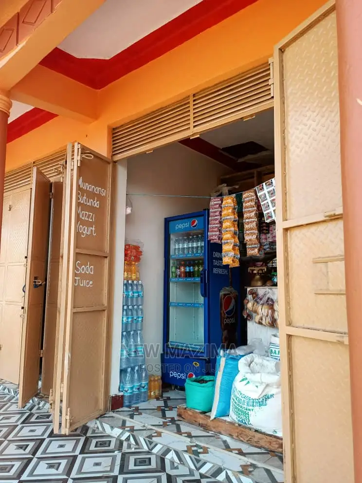 Three Comercial Shops With One Main Home On Quick Sale Kawempe