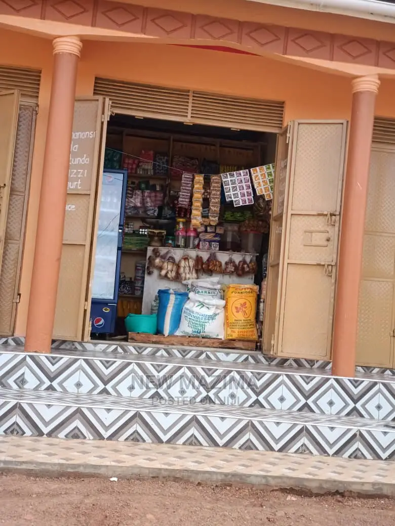 Three Comercial Shops With One Main Home On Quick Sale Kawempe