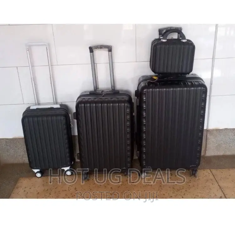 Plastic Waterproof Suitcase With Varying Prices- Black