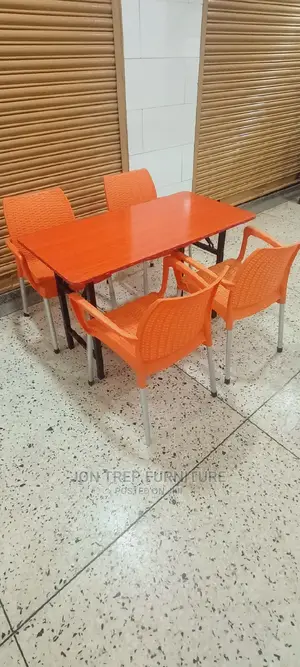Restaurant Table and Plastic Chairs.