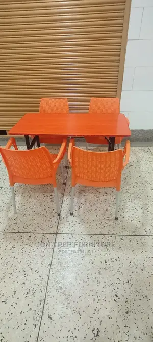 Restaurant Table and Plastic Chairs.