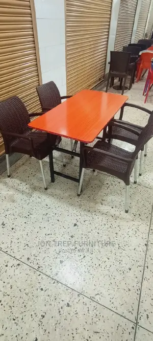 Restaurant Table and Plastic Chairs.