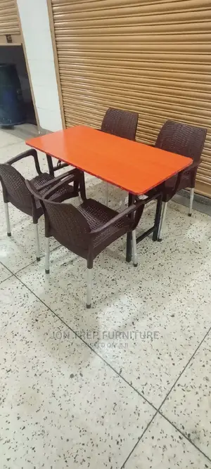 Restaurant Table and Plastic Chairs.