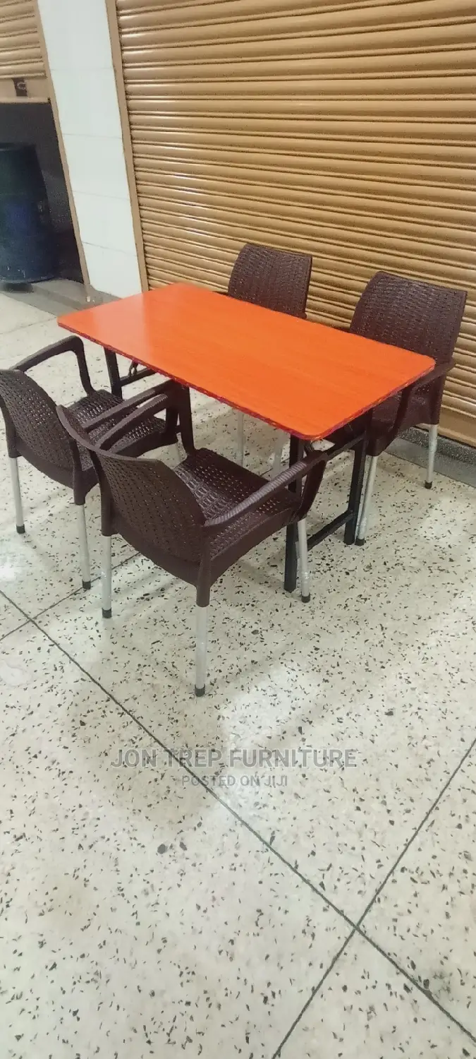 Restaurant Table and Plastic Chairs.