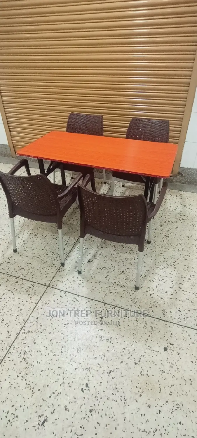 Restaurant Table and Plastic Chairs.